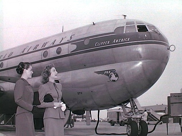 1949 Miss.Peggy Dow & Ann Pearce pose with Pan Am Beoing 377 